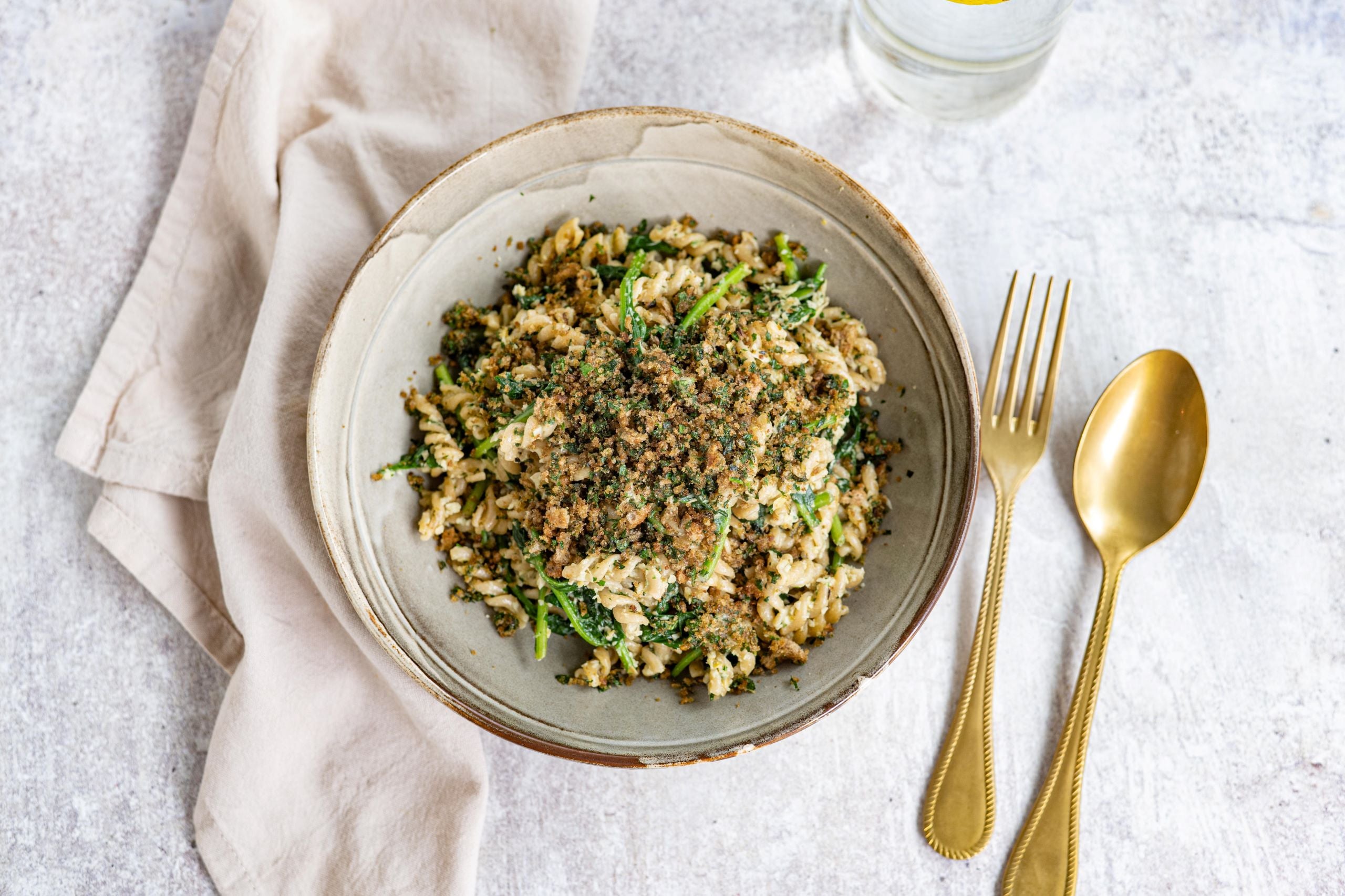 Volkoren pasta met spinazie en artisjok